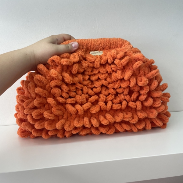 ‘Peach’ puffy clutch